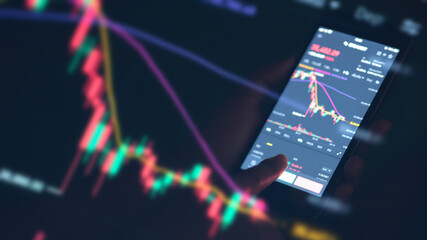 Businessman checking stock market on mobile phone,Stock market. Businessman checking stock market...