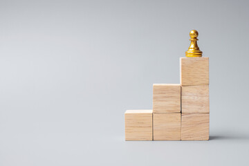 top of golden chess pawn pieces or leader businessman. victory, leadership, business success, team, recruiting, and teamwork concept