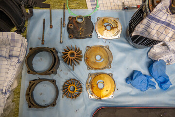 defective pump of a steam sterilizer is disassembled and repaired