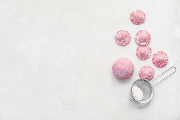 Raw ravioli on light background