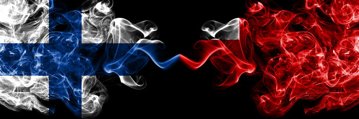 Finland, Finnish vs Abu Dhabi, Emirate smoky flags side by side.