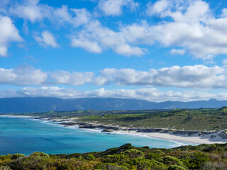 Wonderful elevated views of the Walker Bay Nature Reserve coastline with the Kleinrivier mountains in the far distance. De Kelders near Gansbaai. Overberg. Western Cape. South Africa.