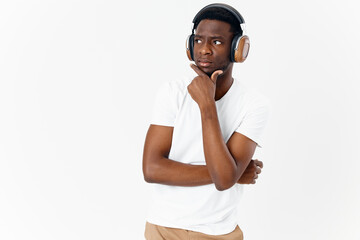 man of african appearance in headphones music in modern technology style