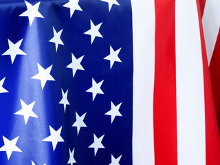 Close-up, the beautiful fabric American flag background. Independence day concept..