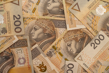 Poland 200 Zlotych bills as background