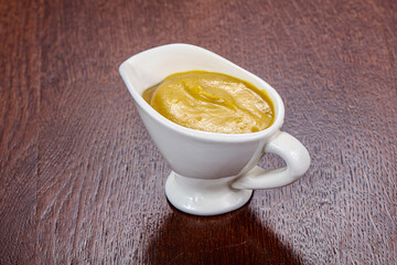 Traditional mustard sauce in the bowl