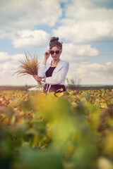 pretty young girl enjoy summer vacation walking at rural field