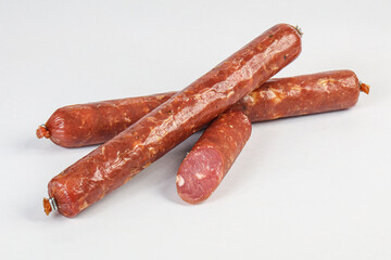 Pork ham sausage cut isolated