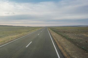 Fototapeta na wymiar Quiet and empty road in Mongolia