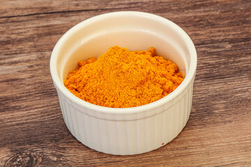 Tumeric powder in the bowl