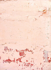 Old stucco wall texture of pink color