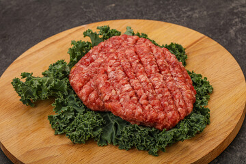 Raw beef burger cutlet for cooking
