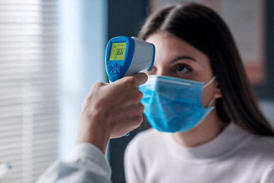 Body temperature check with infrared thermometer