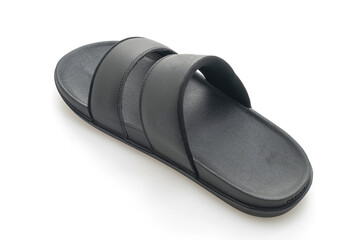 black leather sandals on white background