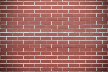 Vintage brown bricks block wall with soft lighting background. Grunge wallpaper for decorative or design. Restricted area or obstruction concept.