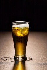 glass of beer isolate on black