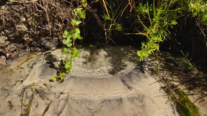 water flowing into the river