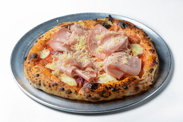 Pizza Prosciutto served on a metal tray over white background.