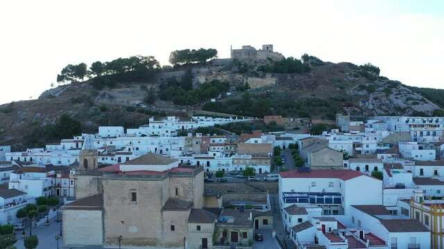 AERIAL - Sunrise at the town of Espera, Cadiz, Spain, wide shot backward