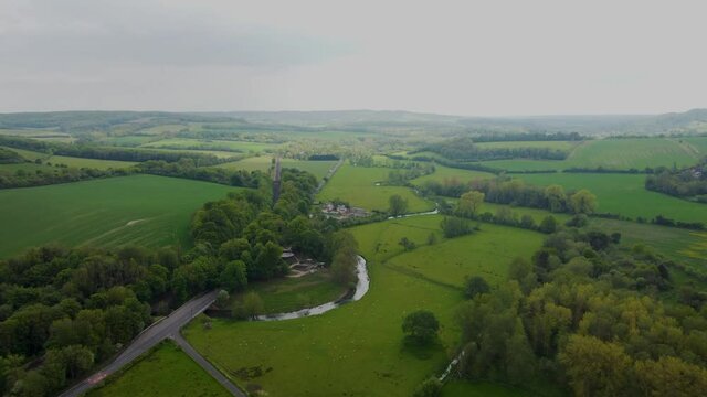 Green scenery of Chilham with a small river.