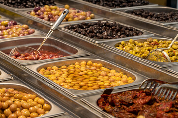Olive varieties for sale at the counter