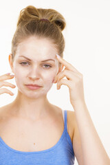 Obraz premium Girl with cream moisture cosmetic on face