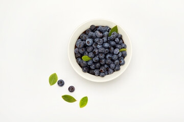 Blueberry on a white background.
흰 배경 위의 블루베리
