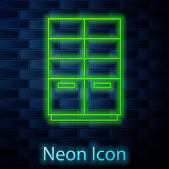 Glowing neon line Wardrobe icon isolated on brick wall background. Vector