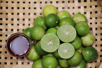 Lime with honey on a basket.