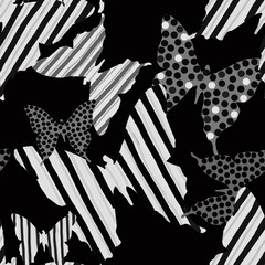 Black and white ornamental butterflies on black background seamless pattern for all prints.