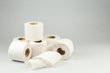 Rolls of Toilet Paper over Gray Background
