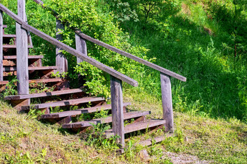 wooden staircase on the river bank