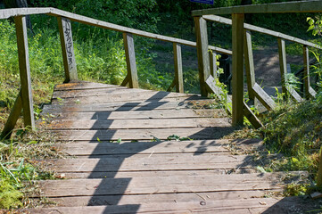 wooden staircase on the river bank