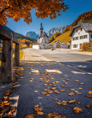 Scenic image of nature landscape. Wonderful sunny autumn scenery in Bavarian Alps. famous Parish Church of St. Sebastian in Ramsau in falltime, Nationalpark Berchtesgadener Land, Bavaria, Germany