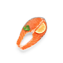 Fresh piece of salmon steak with lemon and parsley isolated on white background. Top view, flat lay.