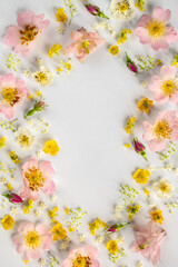 Floral frame on a white background.. Beautiful floral pattern in pastel colors. Flat lay, top view, copy space