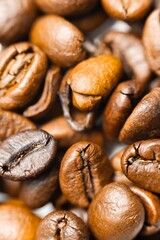 Pile of roasted coffee beans closeup photo