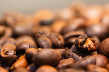 Pile of roasted coffee beans closeup photo