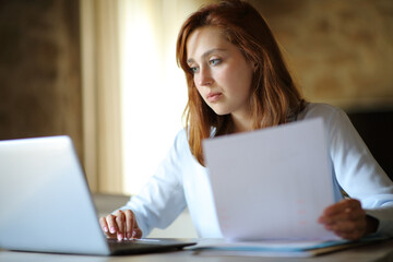 Entrepreneur working online at home or hotel room