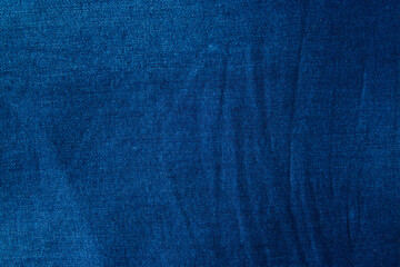 Textured striped blue jeans. Canvas denim texture. Blue denim that can be used as background. Blue...