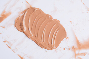 The texture of the foundation is beige under the make-up. Beautiful textured background for your ideas