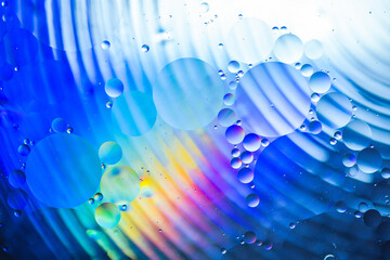 Colorful oil drops in water abstract background
