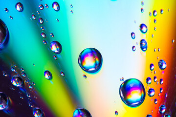Colorful oil drops in water abstract background