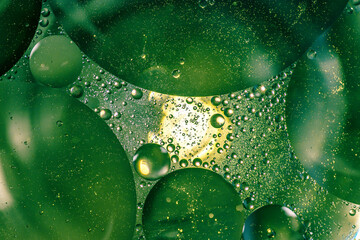 Colorful oil drops in water abstract background