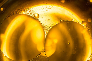 Colorful oil drops in water abstract background