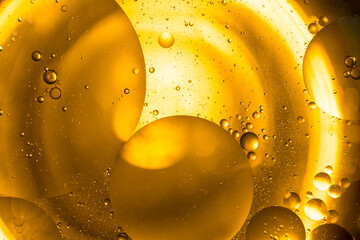 Colorful oil drops in water abstract background