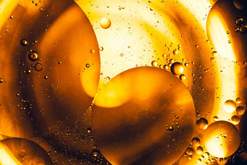 Colorful oil drops in water abstract background