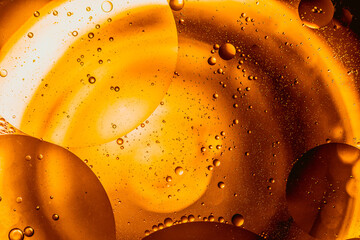 Colorful oil drops in water abstract background