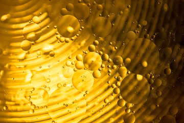 Colorful oil drops in water abstract background