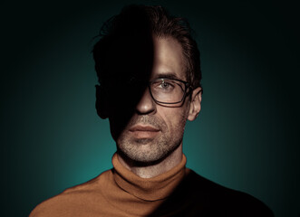 Studio shot of a serious handsome man